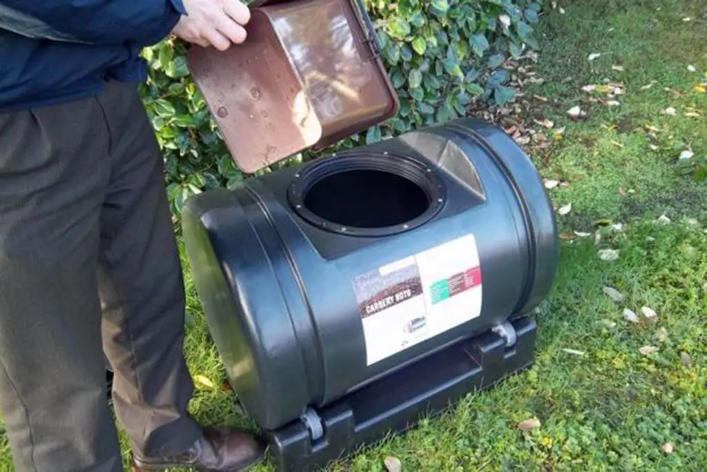 A compost tumbler is a system of rotating drums